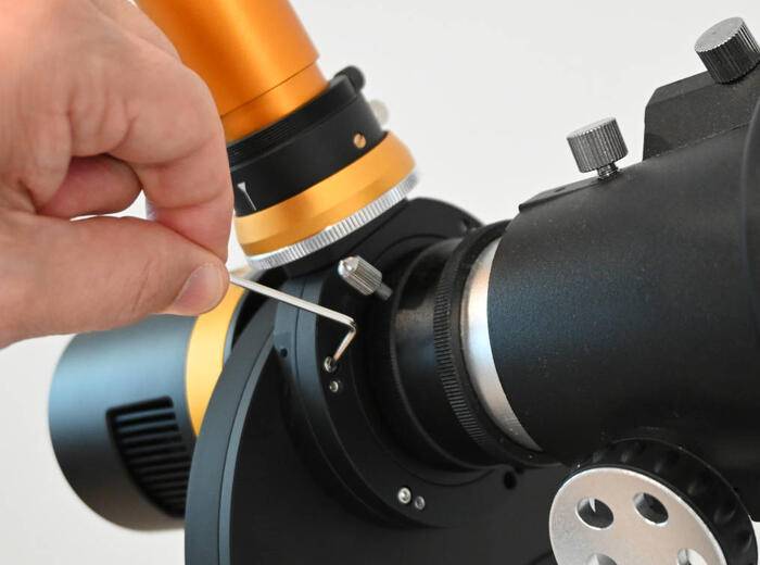 Access tilt adjustment screws from the telescope side.